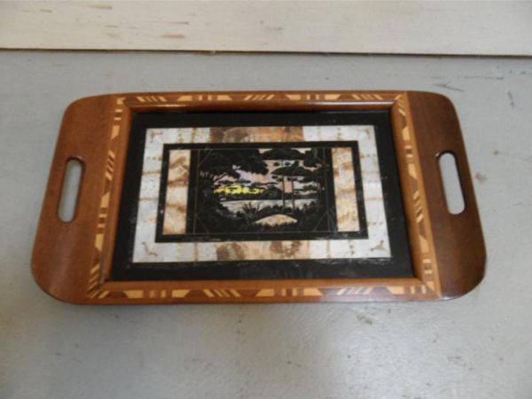 Tray with inlay
