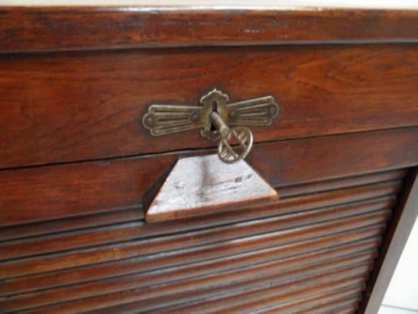 Oak filing cabinet with roller shutter