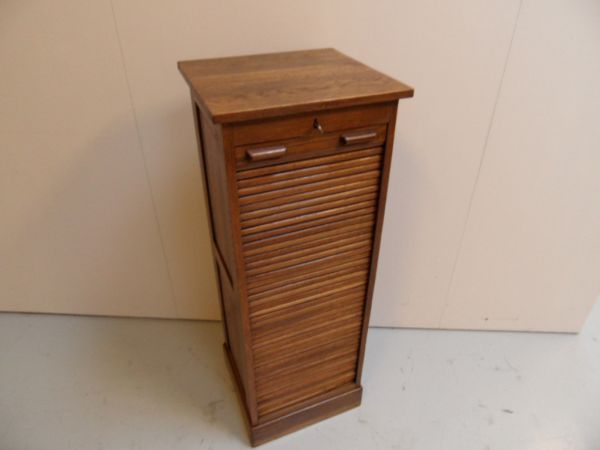 Rolluikkast met lades